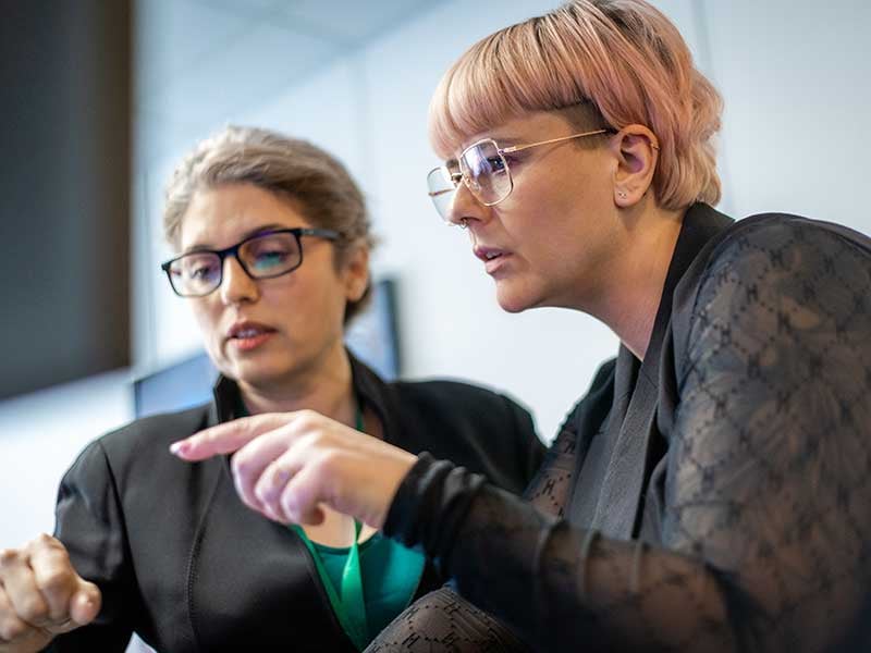 two people discussing