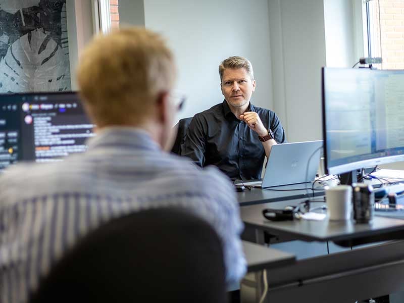 two people in office setting