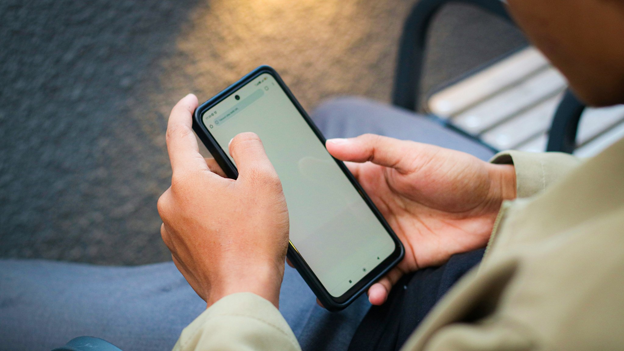 Person_using_smart_phone_TWO_00014